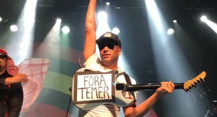 Ex-guitarrista do Rage Against the Machine faz protesto contra Temer em show