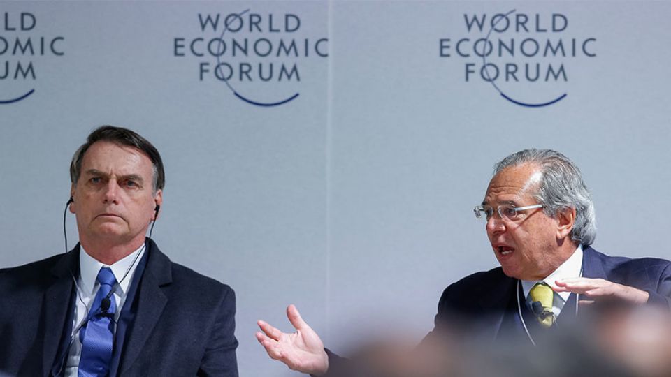 Bolsonaro e Paulo Guedes, em reunião com agentes do sistema financeiro no Fórum Econômico Mundial (Arquivo/PR)