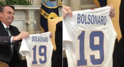 Após abrir Brasil aos EUA, Bolsonaro ganha de Trump camiseta com estampa "suspeita"