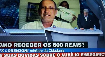 Filha invade entrevista de Onyx Lorenzoni a Datena com cartaz dizendo “Globo Lixo”