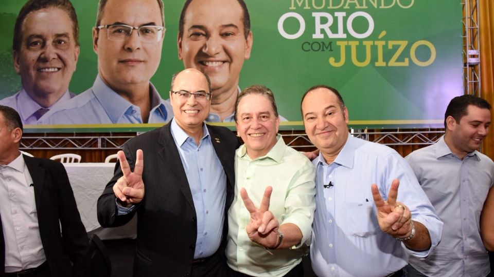 Wilson Witzel e Pastor Everaldo com o pré-candidato à presidente pelo PSC em 2018, Paulo Rabello, ao centro (Reprodução/PSC)