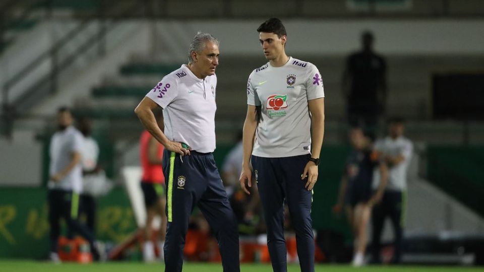 Tite e o filho Matheus - Foto: Lucas Figueiredo/CBF