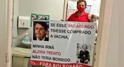 Homem se imuniza e exibe banner: "Se esse vagabundo tivesse comprado vacina, minha irmã não teria morrido"