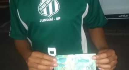 Menino de 13 anos que vendia trufas no semáforo chora após ser enganado com nota falsa de R$ 100