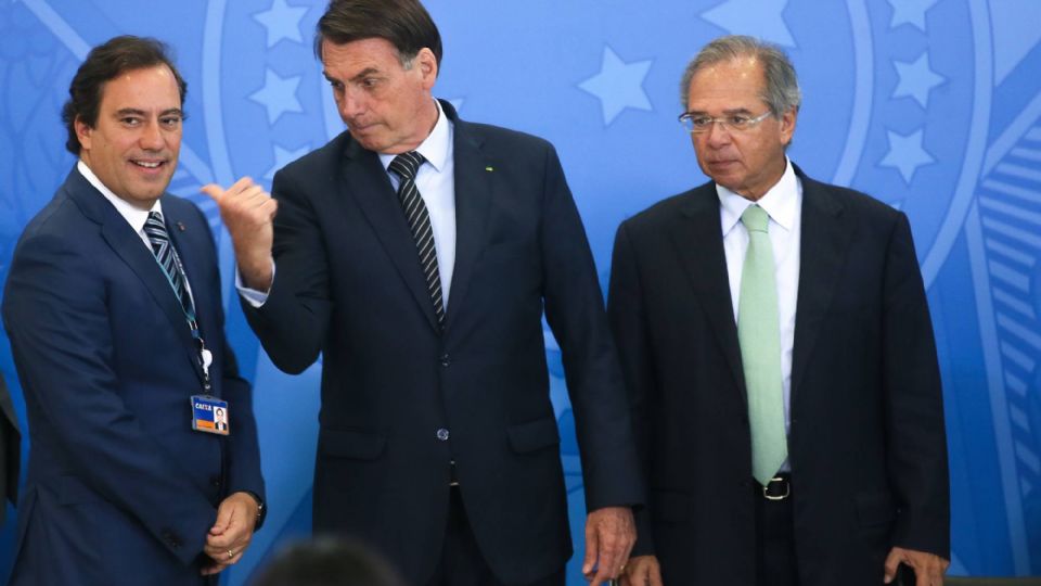 Pedro Guimarães, Jair Bolsonaro e Paulo Guedes (Foto: Antonio Cruz/Agência Brasil)