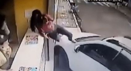 VÍDEO: “Mulher-gato” salta carro que ia atropelá-la e não deixa o milk-shake cair