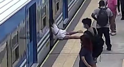 Vídeo impressionante: Mulher passa mal, cai entre vagões do metrô e é resgatada