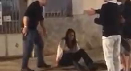 VÍDEO: Com arma na mão, policial militar é flagrado agredindo mulher em praça de Mariana MG