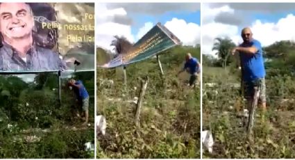 VÍDEO: A golpes de machado, homem derruba outdoor de Bolsonaro em seu terreno; "Odeio ele, tá?"