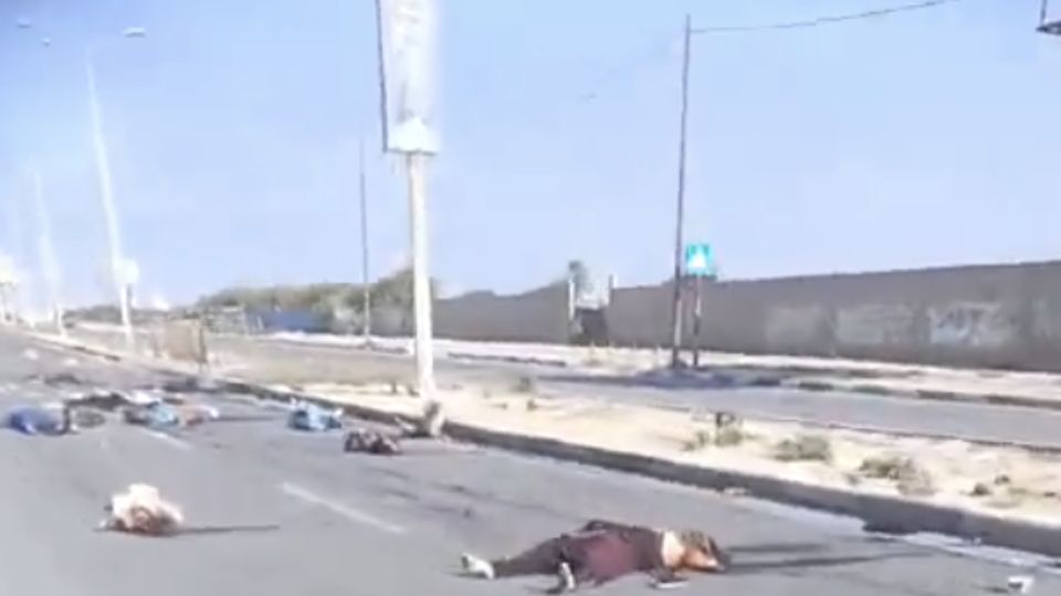 Corpos caídos na avenida costeira de Gaza