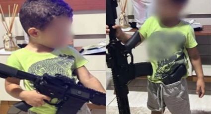 Traficante fotografa filho de quatro anos com armamento pesado