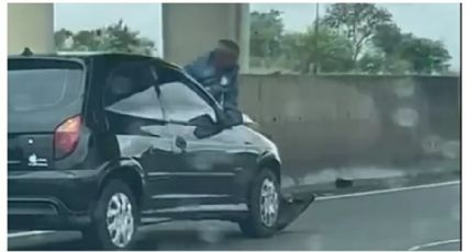 CENAS FORTES: Mulher percorre 9 km com ex no capô do carro após ele recusar término