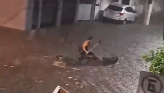 VÍDEO: O resgate dramático de idosa presa após água da chuva invadir elevador