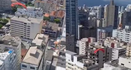 VÍDEO: Mulher perde controle de parapente e cai na sacada de apartamento em Santos